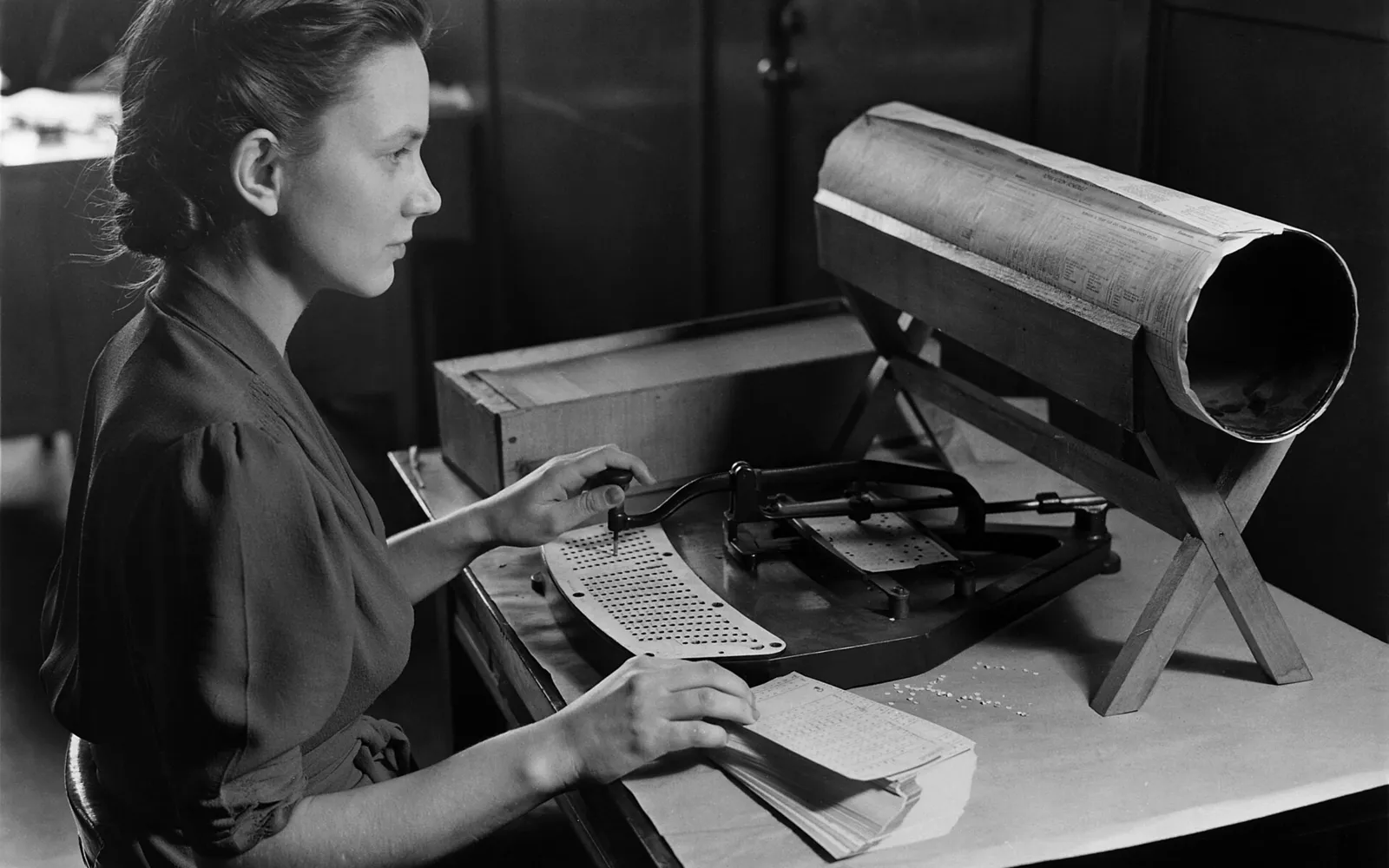 Historic census card-punch operator at work