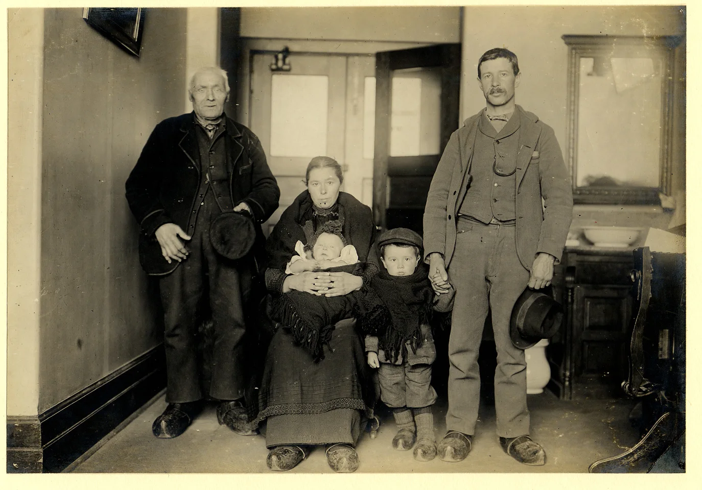 A German immigrant family of five posed together at Ellis Island