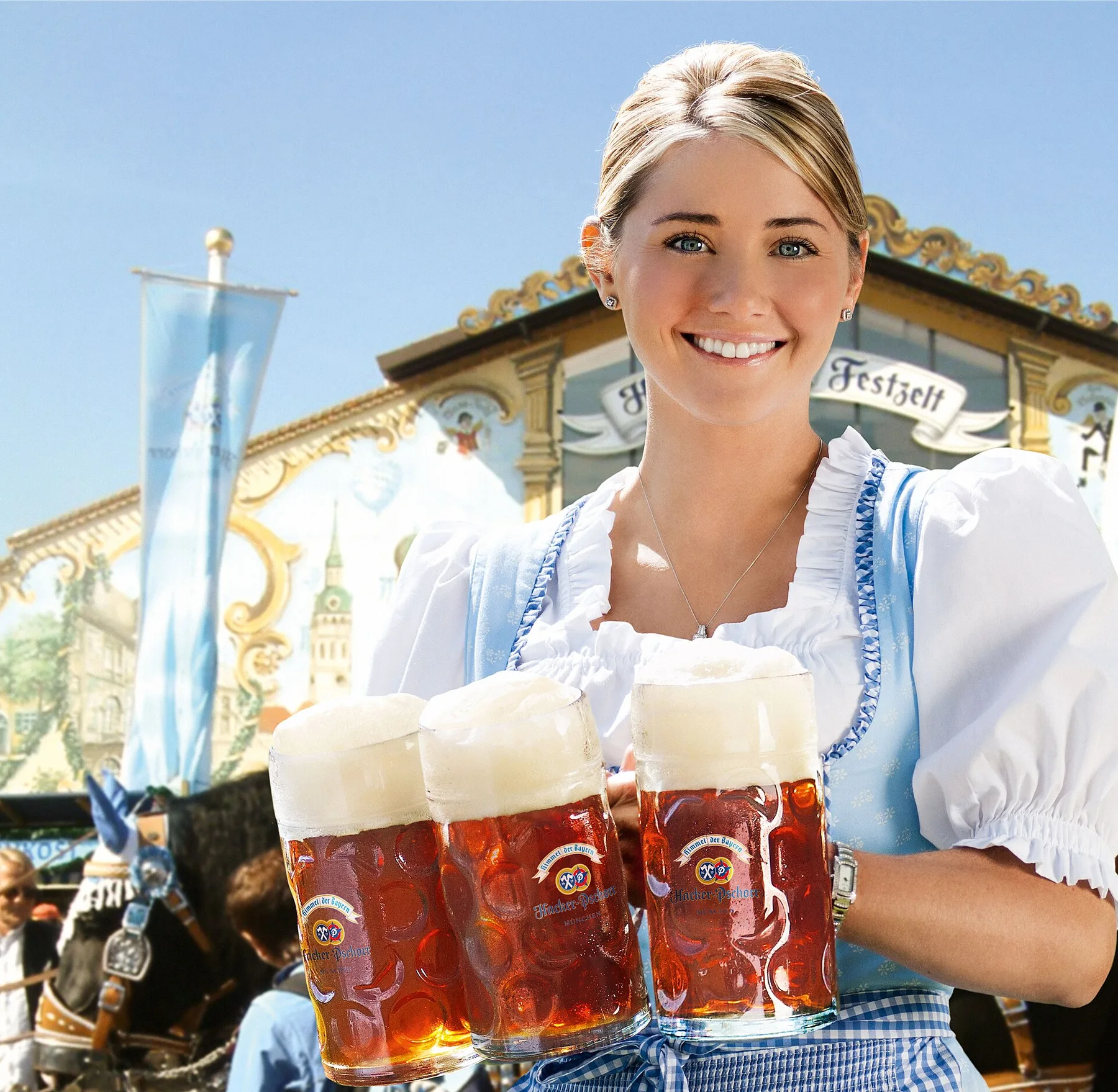 Oktoberfest server wearing a blue-and-white dirndl and carrying four glass beer mugs